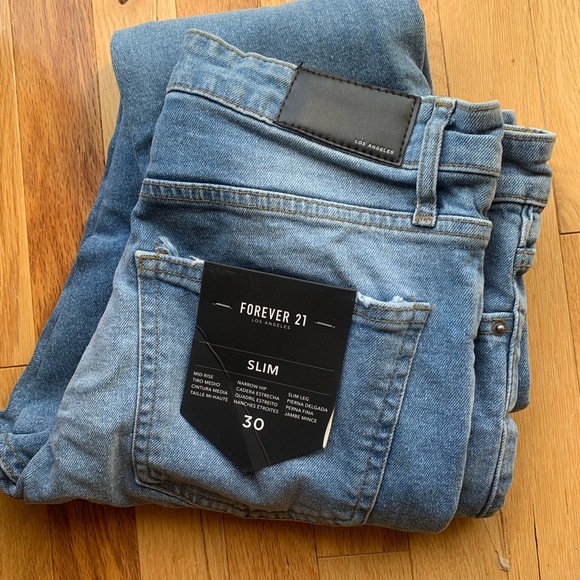 Slim distressed jeans.  Mens jeans but perfect for anybody! Perfect for fall! - Picture 4 of 5